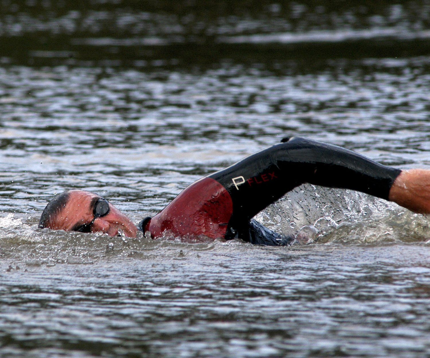 Slovenian marathon swimmer Martin Strel, 52, swims the final stretch across Guajará Bay that branches off the Amazon River towards the port city of Belem, at the river's mouth, April 8, 2007, 67 days after beginning his swim in the Amazon headwaters in Peru. Strel, who holds Guinness Book records for swimming the Danube in Europe, the Mississippi in the United States and the Yangtze in China, swam the length of the Amazon to break his own record for the world's longest swim, having swum 5,268 kms (3,274 miles) according to the organization's Amazon Swim website. REUTERS/Paulo Santos - RTR1OG0S