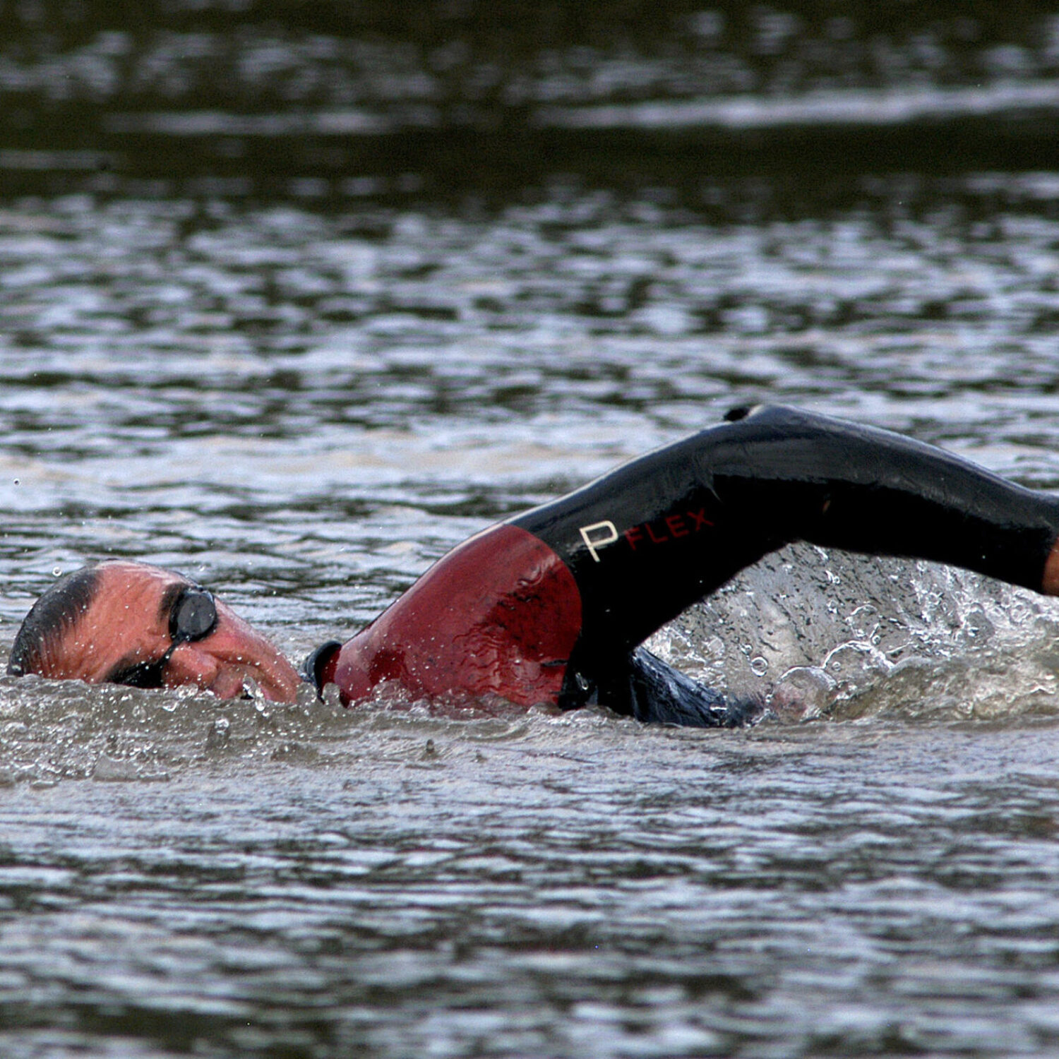 Slovenian marathon swimmer Martin Strel, 52, swims the final stretch across Guajará Bay that branches off the Amazon River towards the port city of Belem, at the river's mouth, April 8, 2007, 67 days after beginning his swim in the Amazon headwaters in Peru. Strel, who holds Guinness Book records for swimming the Danube in Europe, the Mississippi in the United States and the Yangtze in China, swam the length of the Amazon to break his own record for the world's longest swim, having swum 5,268 kms (3,274 miles) according to the organization's Amazon Swim website. REUTERS/Paulo Santos - RTR1OG0S